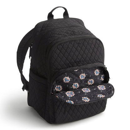 Black quilted backpack with floral pattern on a white background
