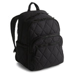 Black quilted backpack on a white background