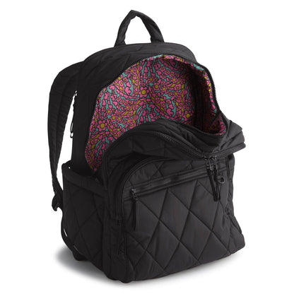 Black quilted backpack with colorful interior lining on a white background