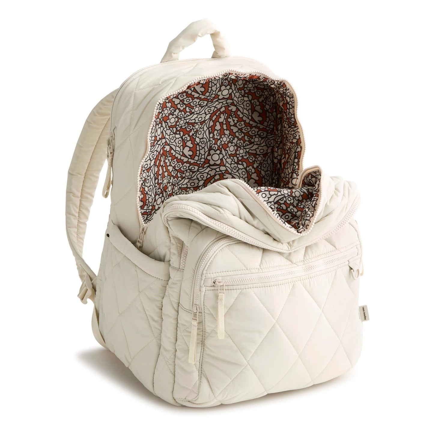 Light gray quilted backpack with patterned interior on a white background