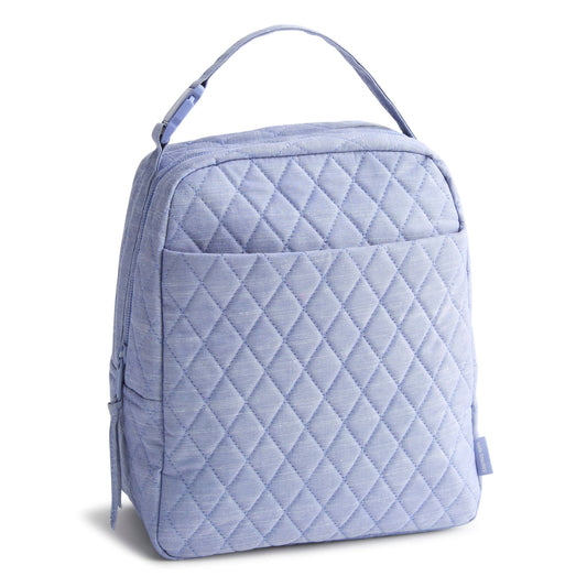 Light blue quilted backpack on a white background