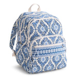 Blue and white patterned backpack on a white background