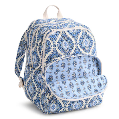 Blue and white patterned backpack on a white background