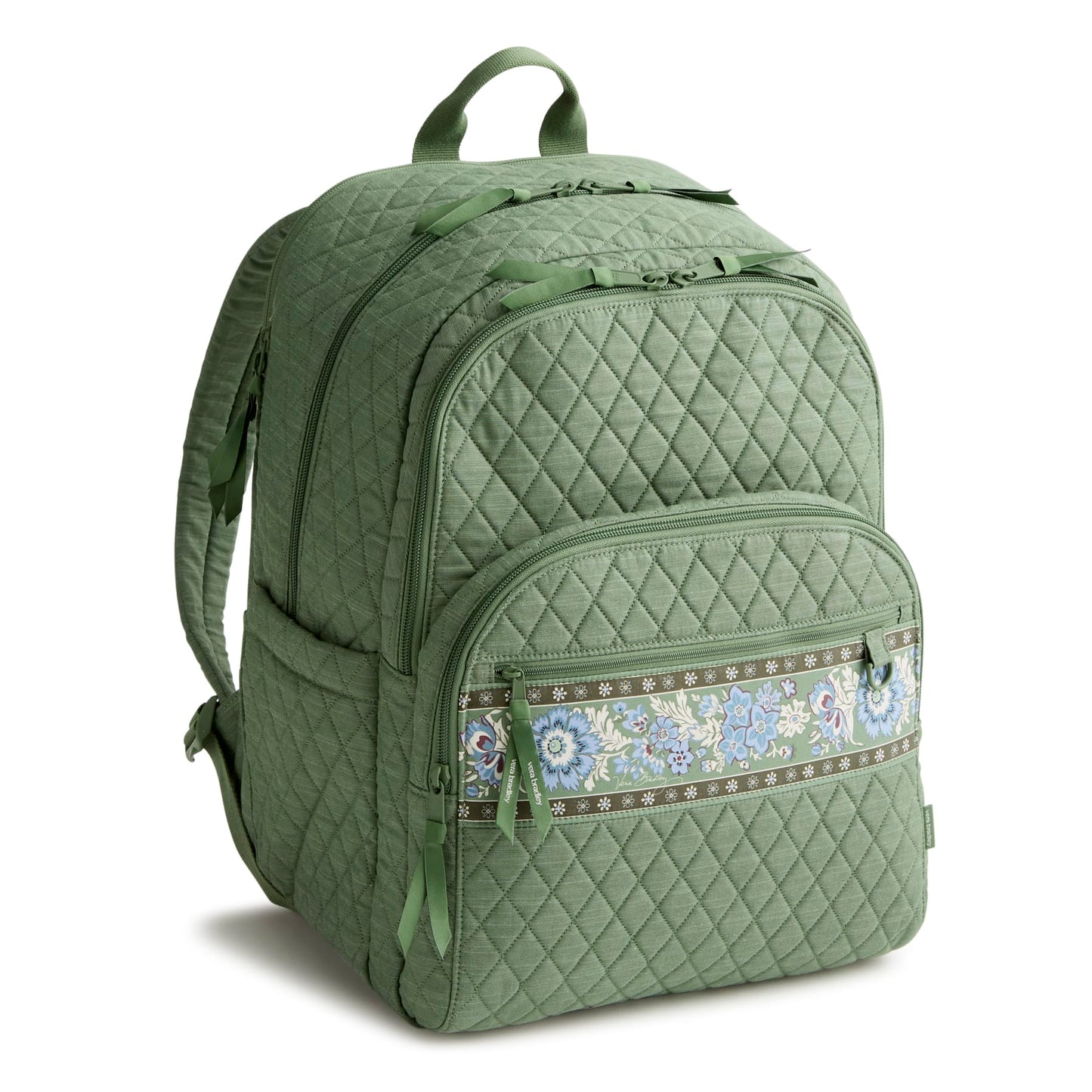 Green quilted backpack with a decorative zipper pull on a white background