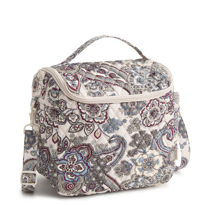 Patterned handbag with floral design on a white background