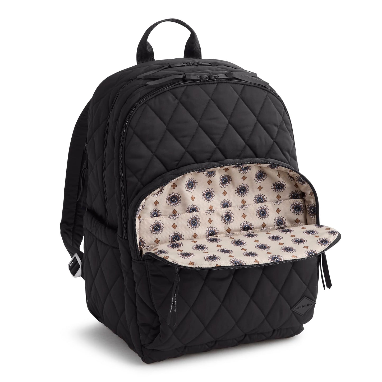 Black quilted backpack with open front pocket showing patterned interior on a white background
