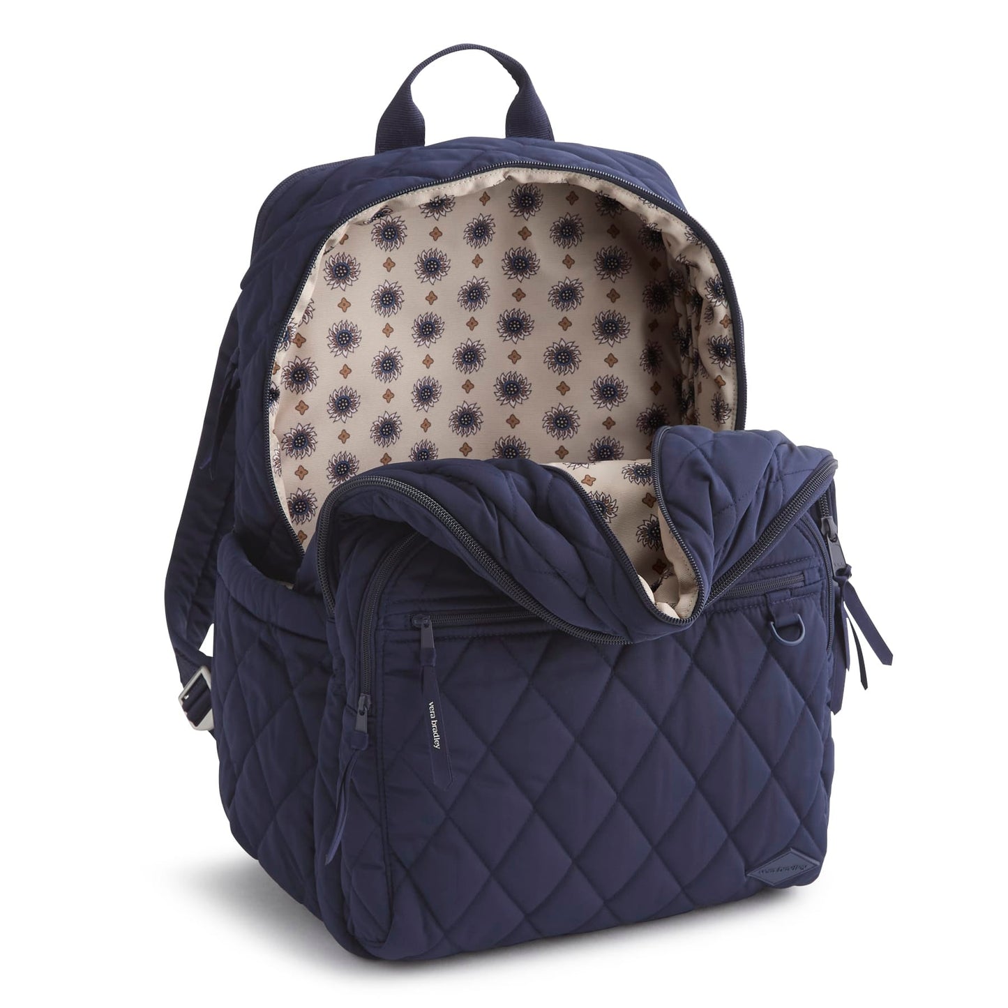 Navy blue backpack with quilted design and patterned interior on a white background