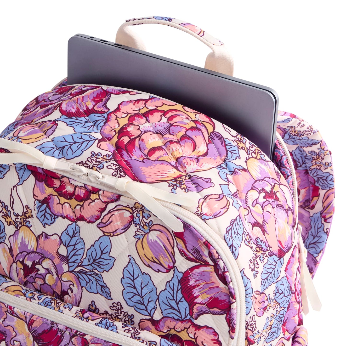 Floral-patterned backpack with a laptop compartment on a white background