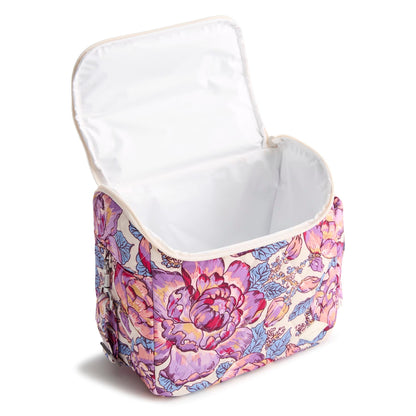 Floral-patterned storage basket with a white interior on a white background
